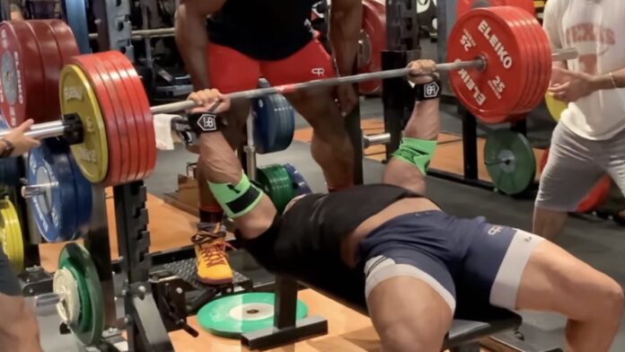 A paused bench press of 665 pounds for Larry Wheels.